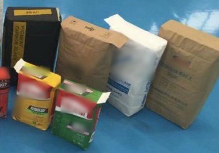 Valve bags made for several customers; their brands are blurred