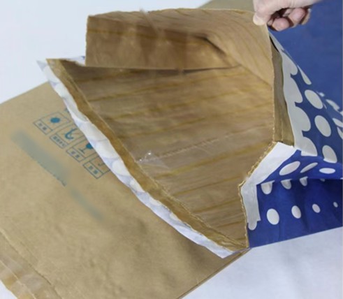 Pinch-bottom paper bag opened to show the other type of gusset